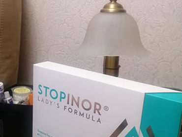 Упаковка Stopinor для женщин крупным планом.